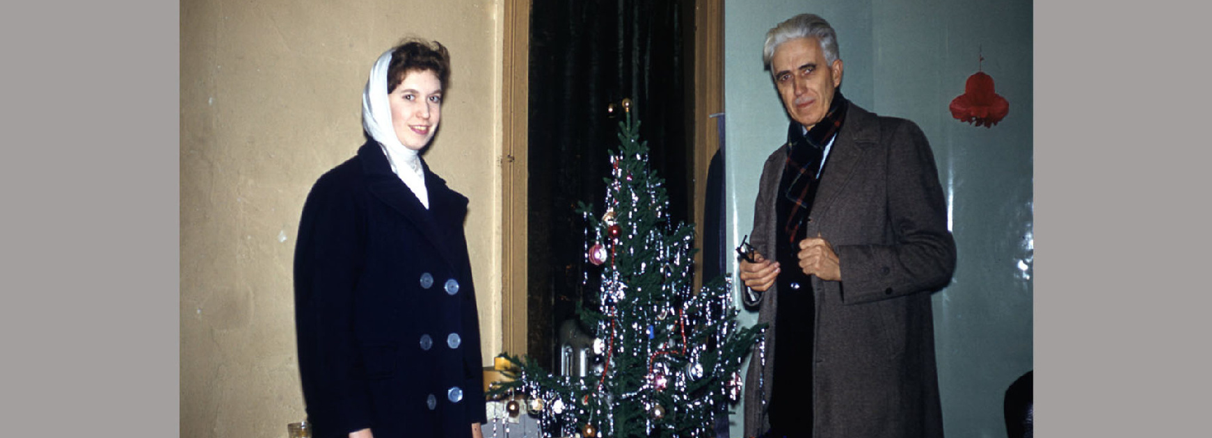 35mm slide photograph (1959) of Clyfford and Diane Still gathered around a Christmas tree in the studio at 128 West 23rd Street, New York City where they lived.