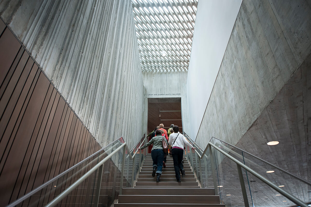 Women walk up the stairs at the Clyfford Still Museum