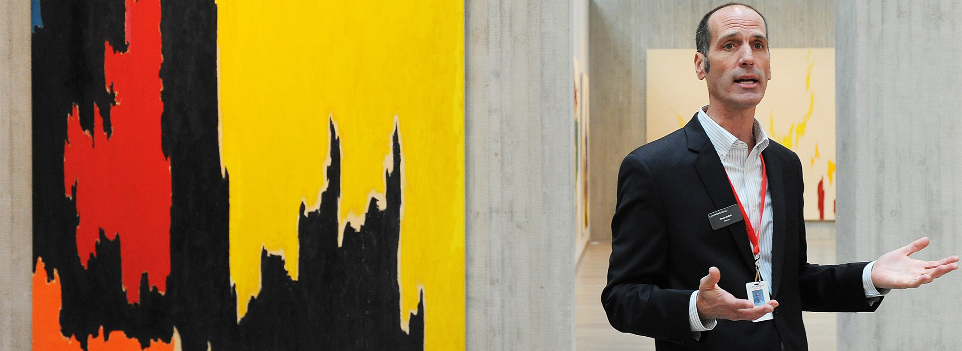 Man stands in a gallery at the Clyfford Still Museum