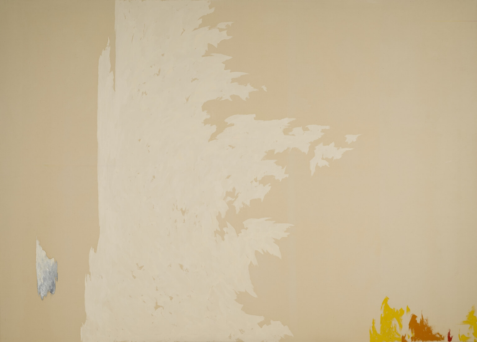 Abstract painting with bare canvas, large splotch of tan and white paint in the middle that looks like it is blowing, with small patches of blue, yellow, and red paint