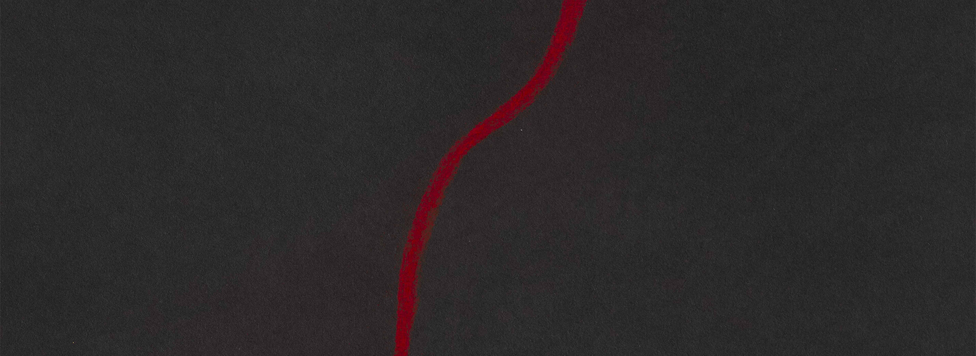 Black construction paper with a red line drawn in pastel moving upwards