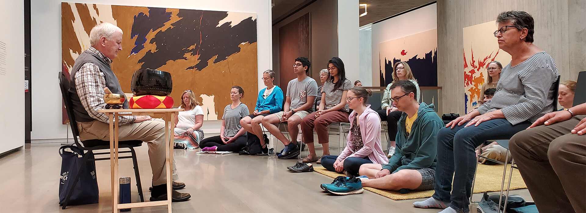 People meditate in a Clyfford Still Museum gallery