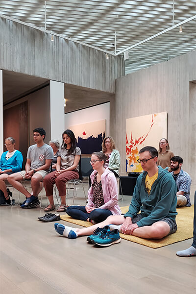 People meditate in a Clyfford Still Museum gallery