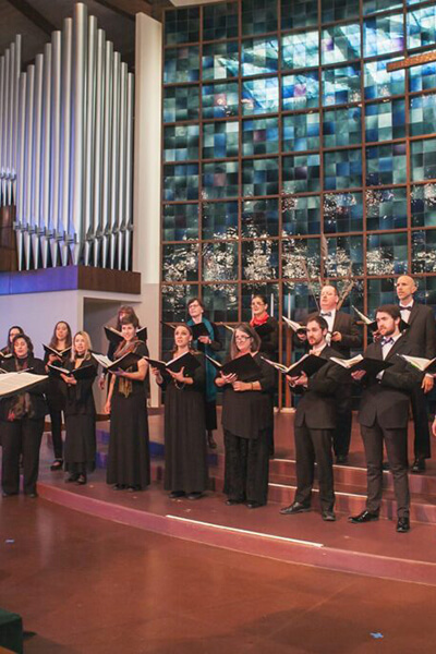 A choir performs on stage