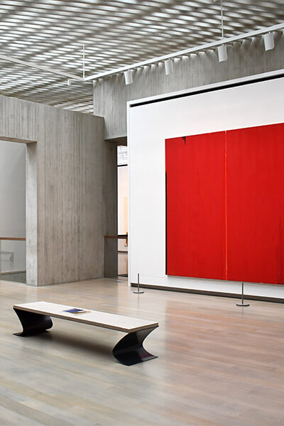 Gallery installation image with a red painting