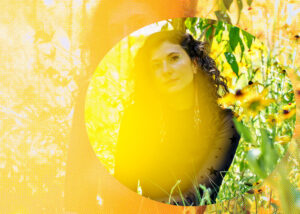 A photo of a woman with a circular yellow design over it