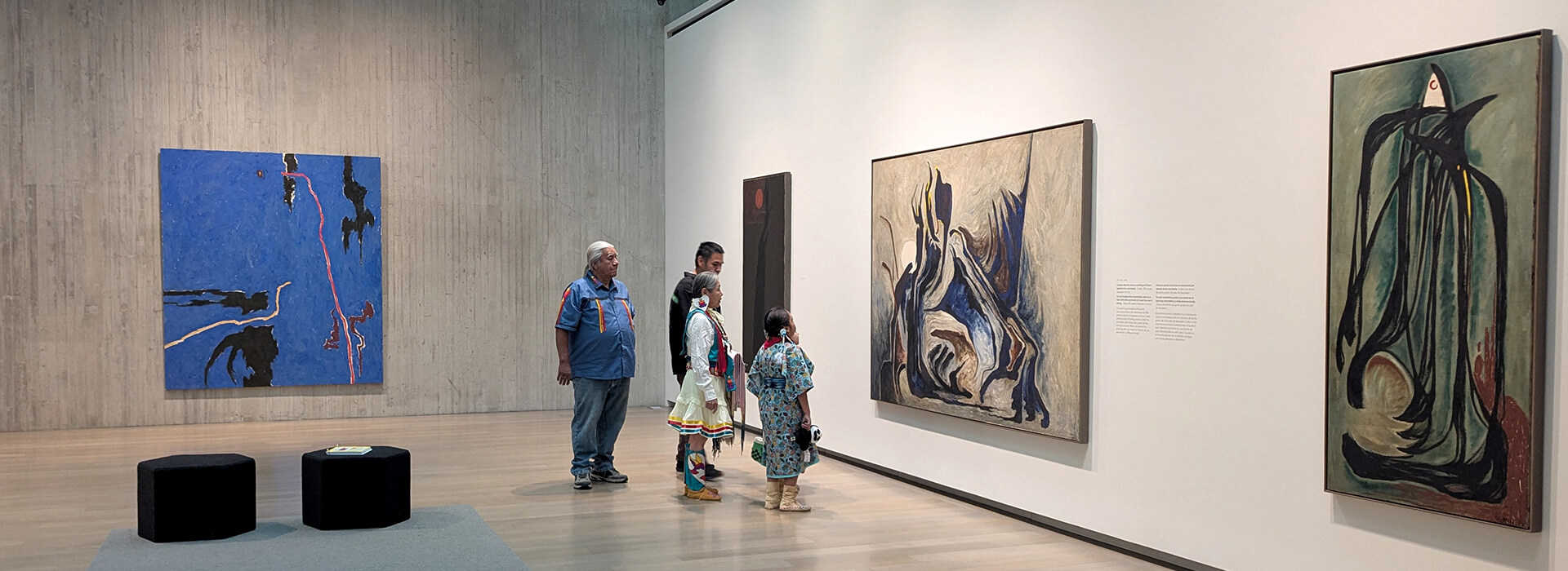 A family looks at art in the Clyfford Still Museum