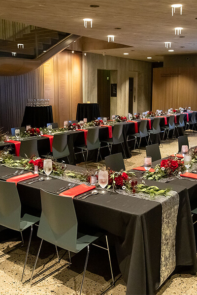 A table is set up and decorated in a lobby