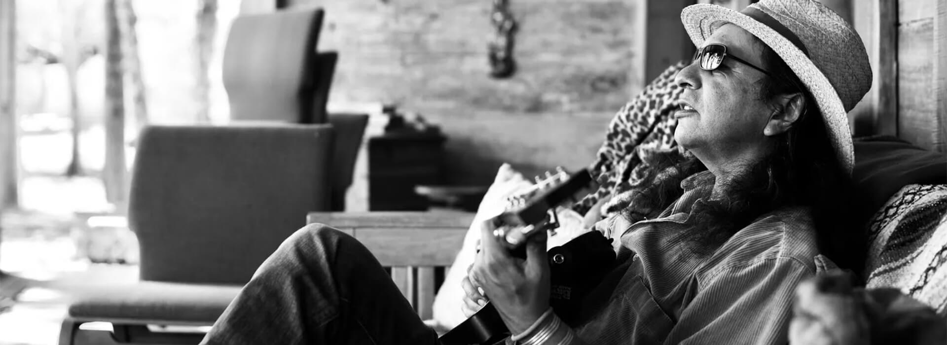 Cary Morin playing guitar