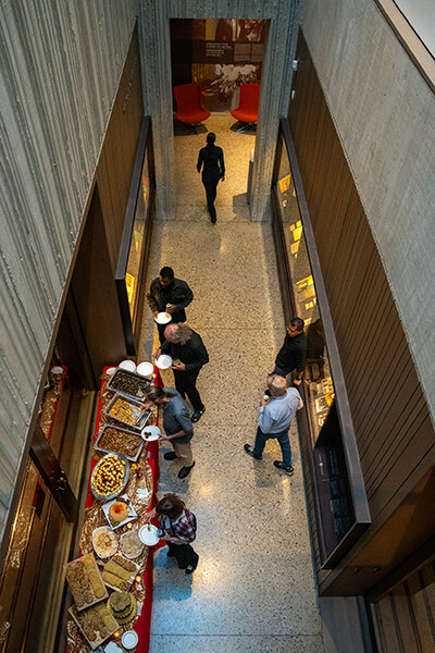 People line up for a party buffet