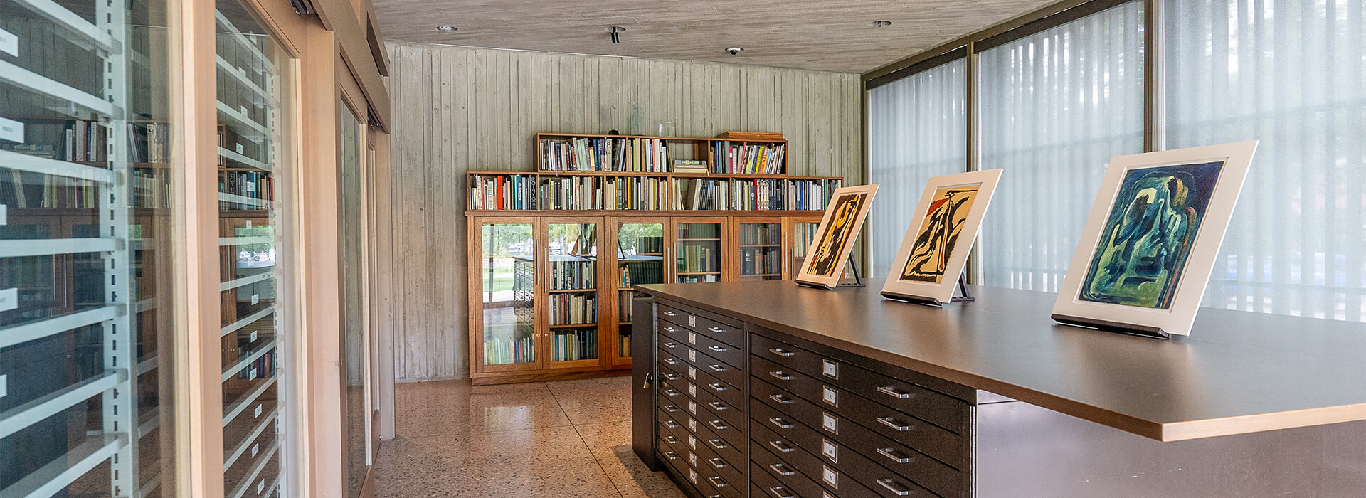 Research Lab at the Clyfford Still Museum with three works of paper on easels on a center table