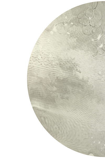 Half of a sumi sound print in a circular shape