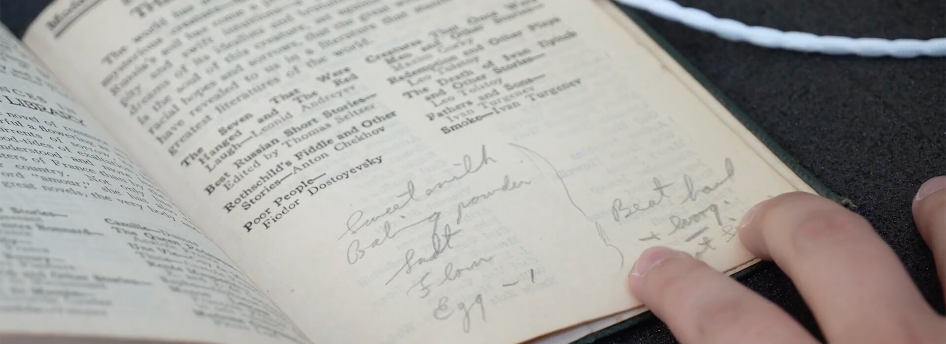 Closeup of a book with notes written in it
